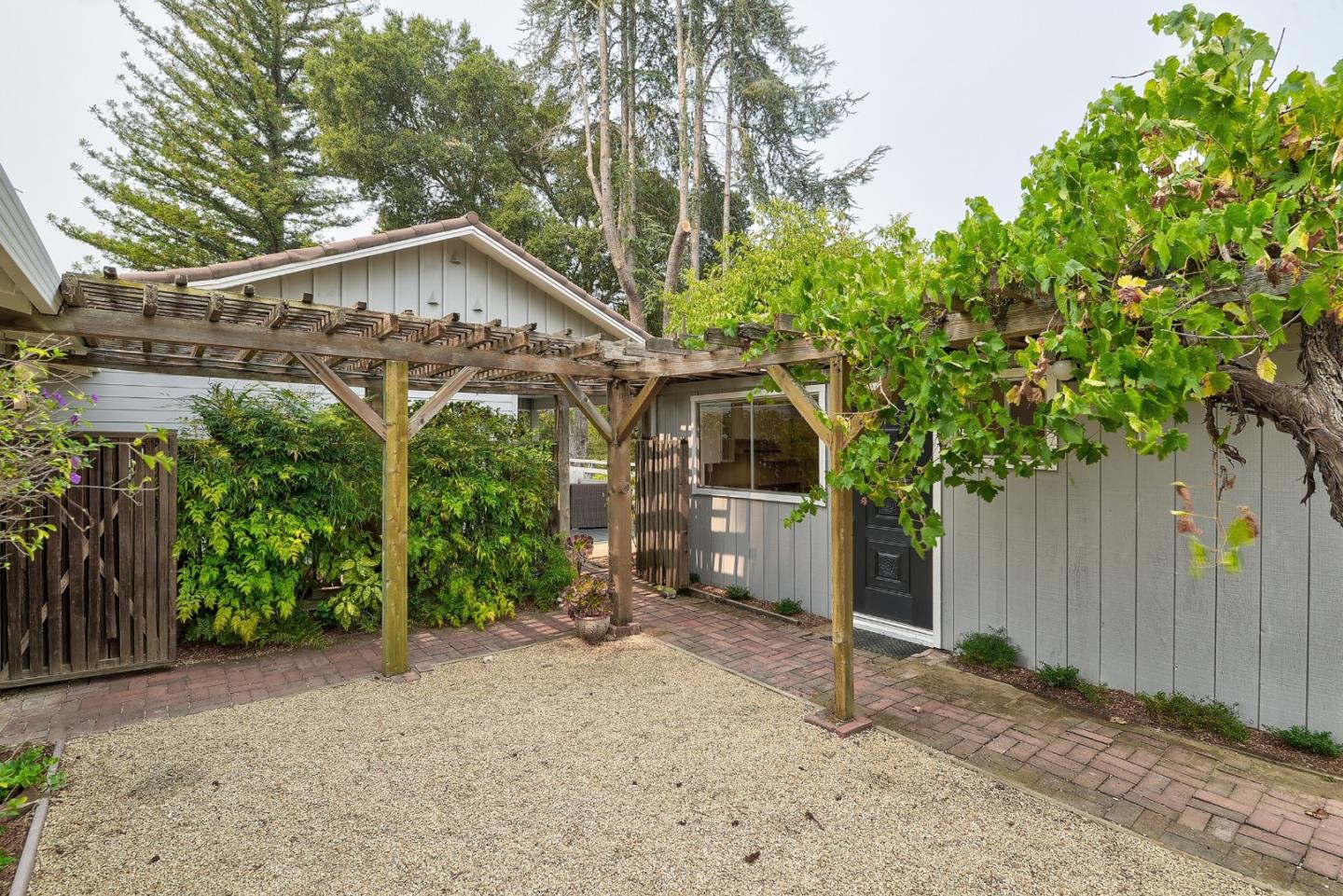 148 Bardet Road Woodside, CA 94062 - Photo 25 of 39 a view of a house with a yard and tree