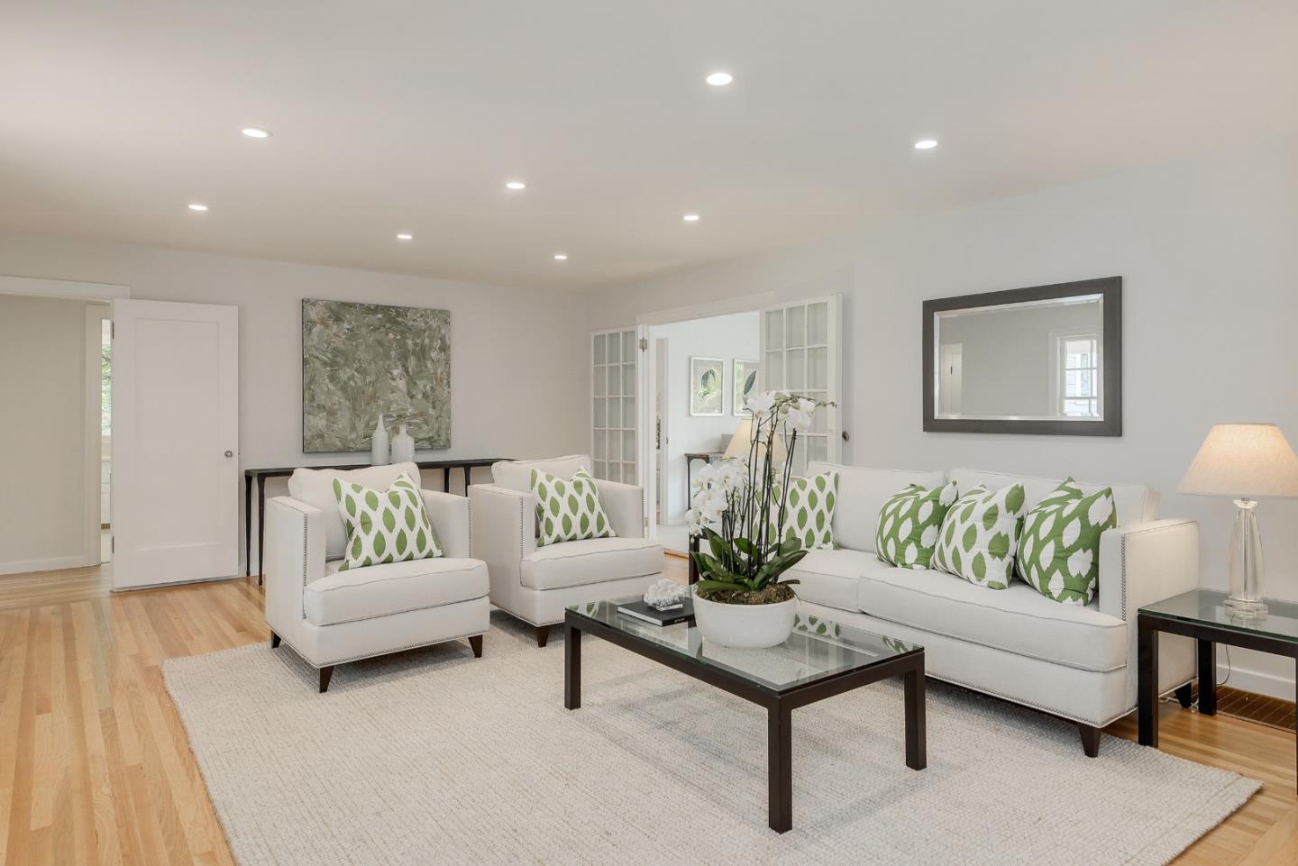 148 Bardet Road Woodside, CA 94062 - Photo 3 of 39 a living room with furniture white walls and a table