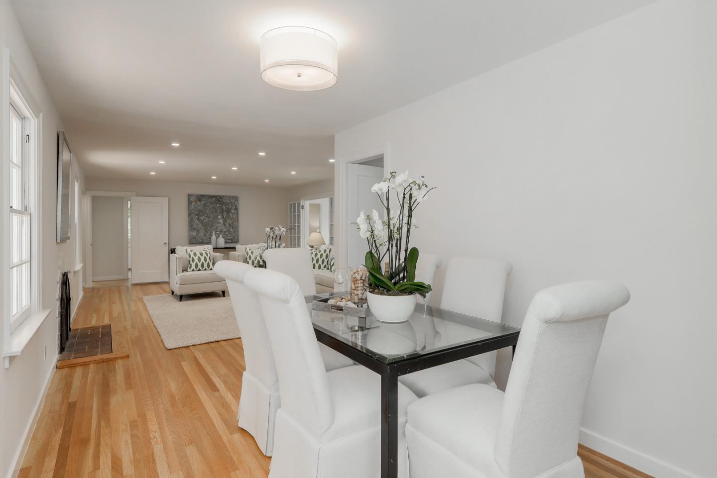148 Bardet Road Woodside, CA 94062 - Photo 7 of 39 a living room with furniture and a table