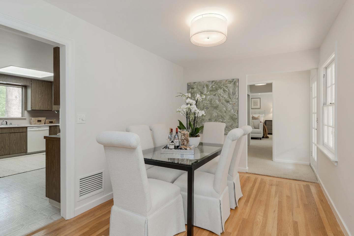 148 Bardet Road Woodside, CA 94062 - Photo 8 of 39 a view of a dining room with furniture and wooden floor