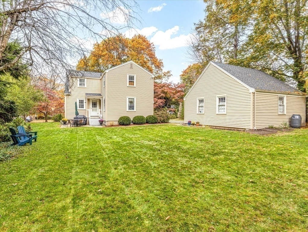 46 Park Street Dedham, MA 02026 - Photo 30 of 35 a view of a house with a yard