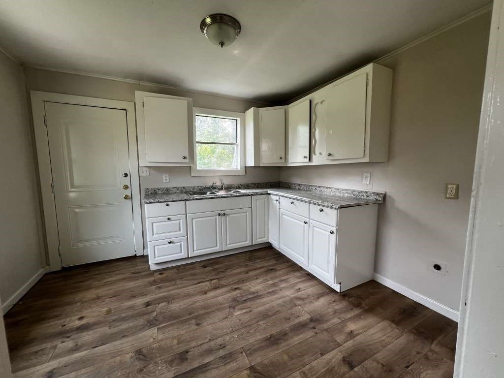 8606 Prairie View Drive Houston, TX 77088 - Photo 6 of 15 a kitchen with stainless steel appliances granite countertop a sink a stove and cabinets