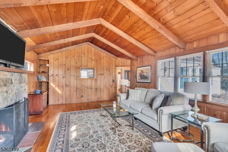 1595 Highway 206 Bedminster, NJ 07921 - Photo 11 of 24 a living room with furniture and a flat screen tv