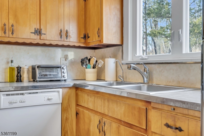 1595 Highway 206 Bedminster, NJ 07921 - Photo 20 of 24 a kitchen with a window and cabinets