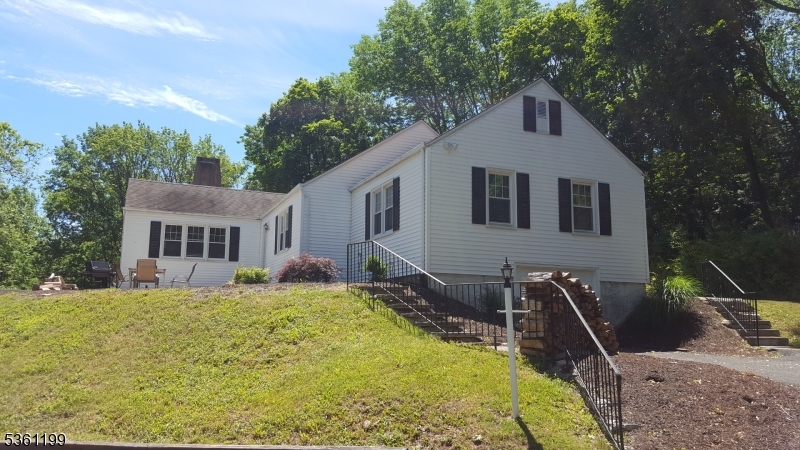 1595 Highway 206 Bedminster, NJ 07921 - Photo 2 of 24 a view of a house with a yard chairs and table in the patio