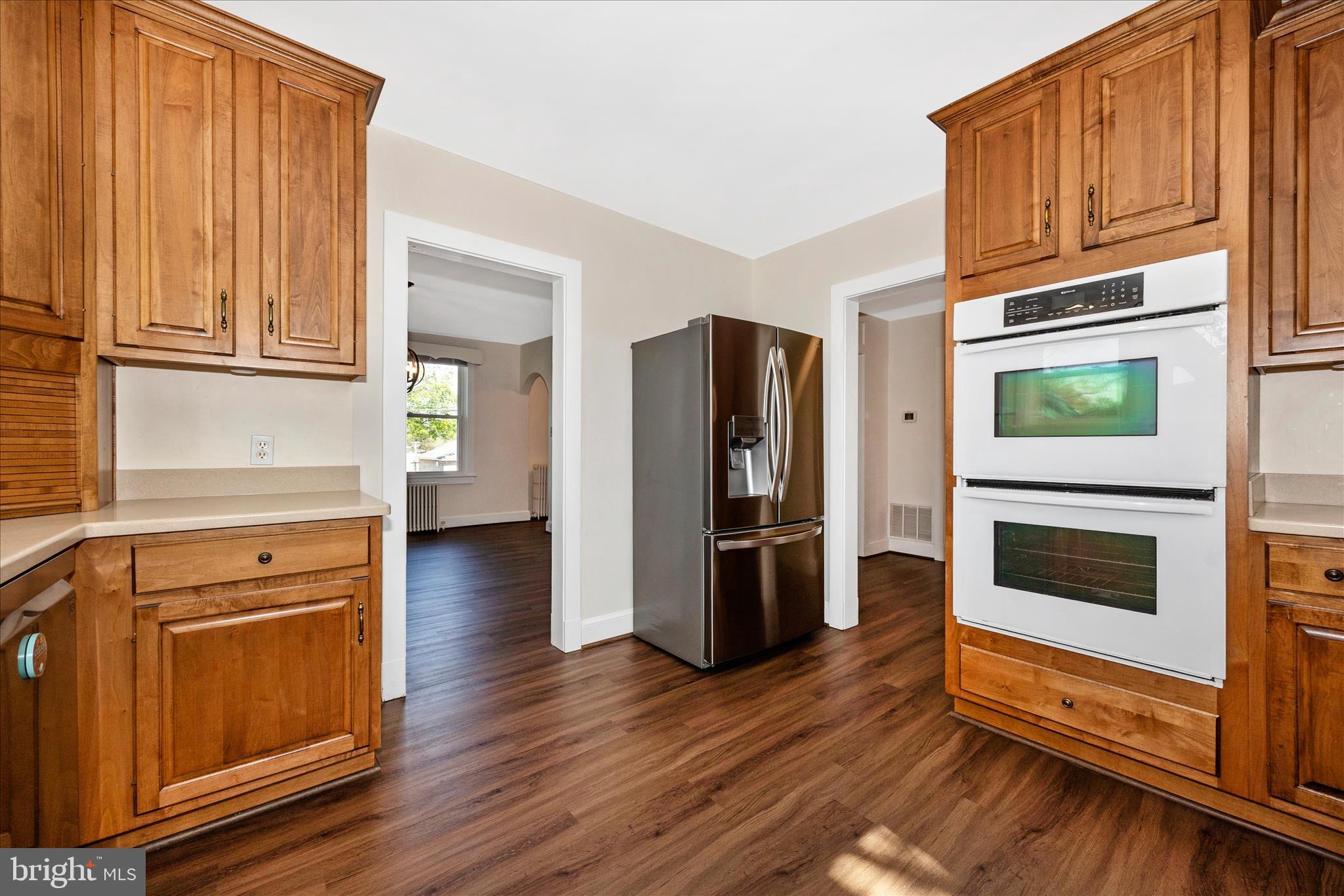 2 Catoctin Avenue Frederick, MD 21701 - Photo 14 of 63 a kitchen with stainless steel appliances granite countertop a refrigerator microwave and stove top oven