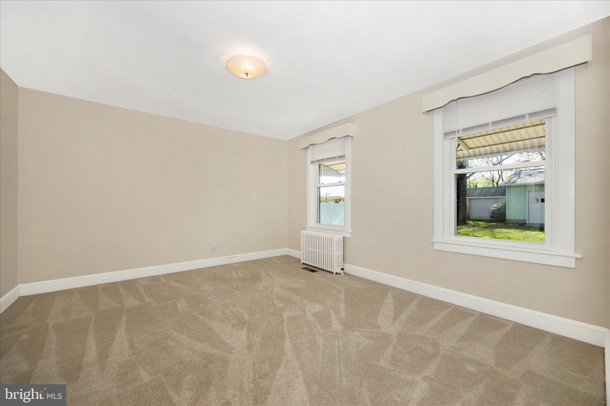 2 Catoctin Avenue Frederick, MD 21701 - Photo 16 of 63 an empty room with windows and closet