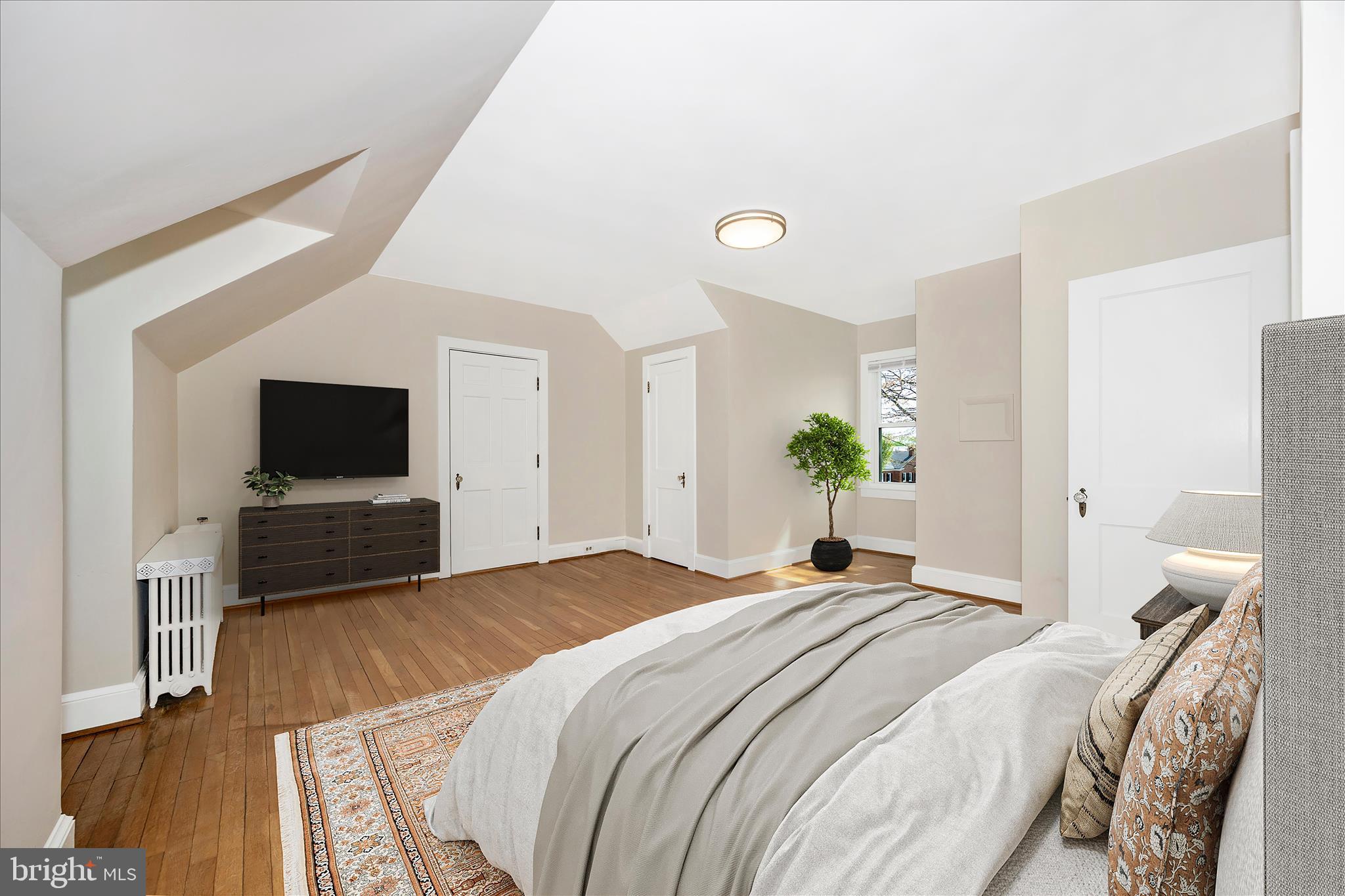 2 Catoctin Avenue Frederick, MD 21701 - Photo 20 of 63 a bedroom with a bed and a flat screen tv