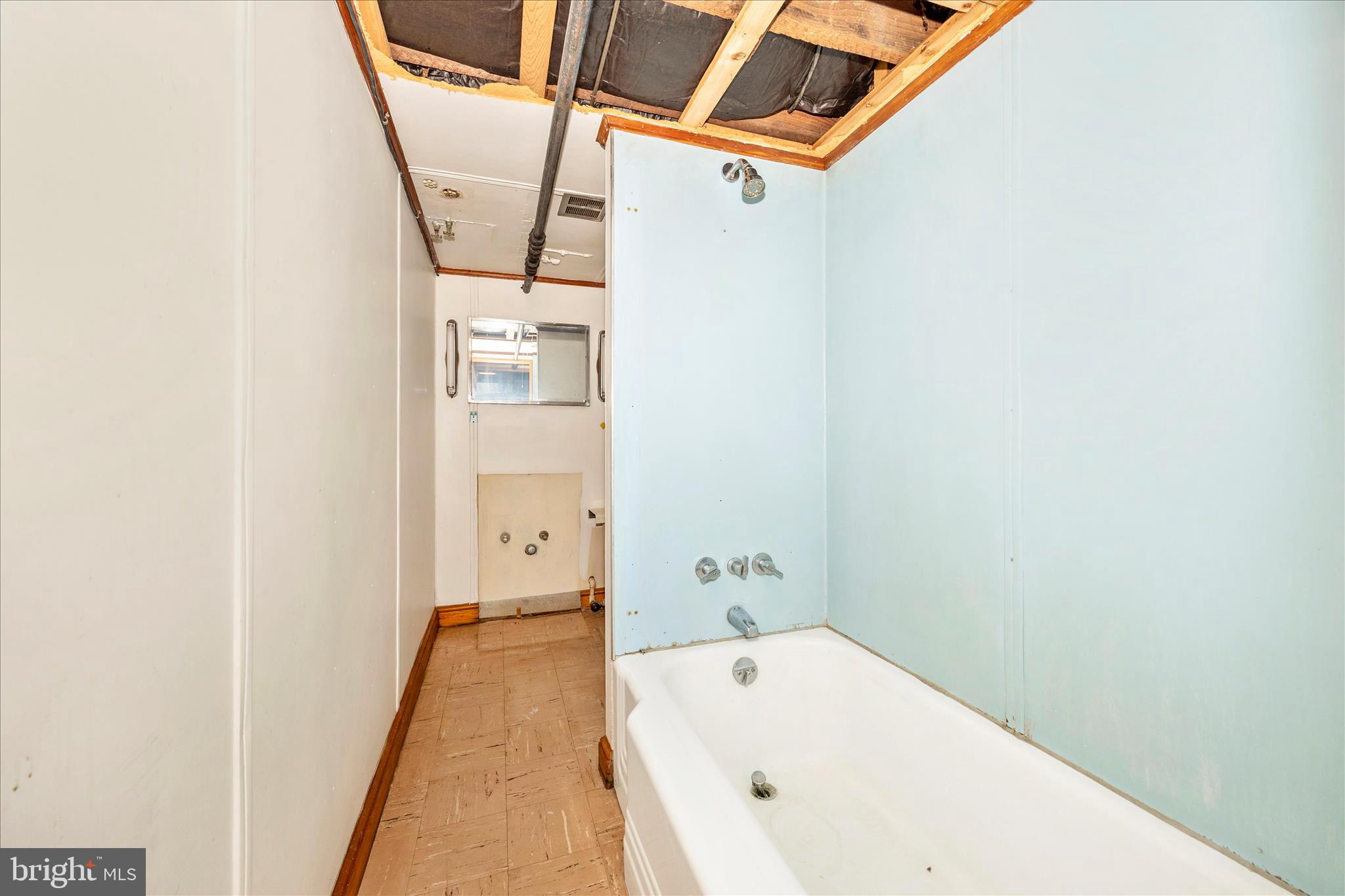 2 Catoctin Avenue Frederick, MD 21701 - Photo 43 of 63 a bathroom with a tub and shower
