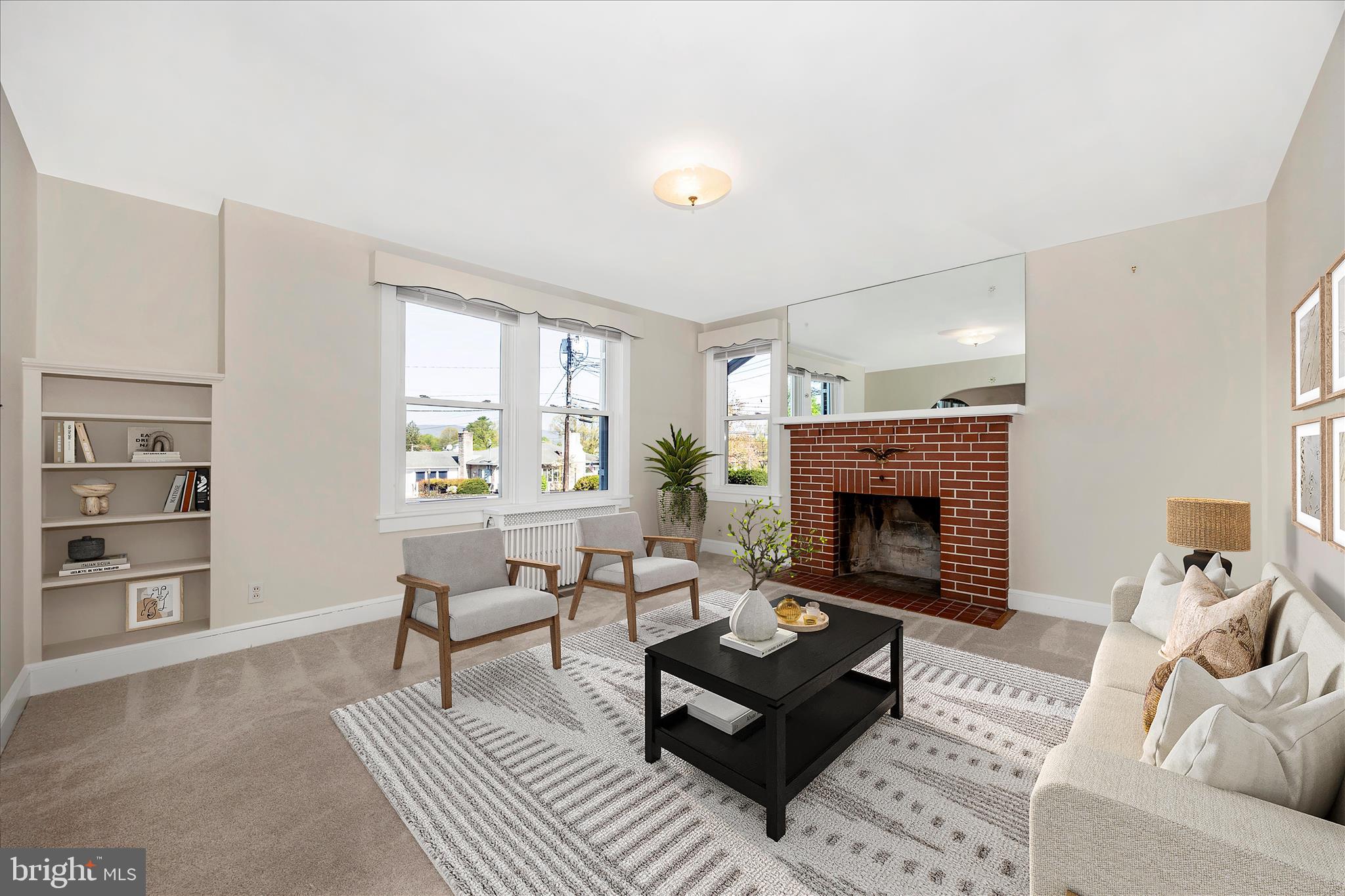 2 Catoctin Avenue Frederick, MD 21701 - Photo 6 of 63 a living room with furniture and a fireplace