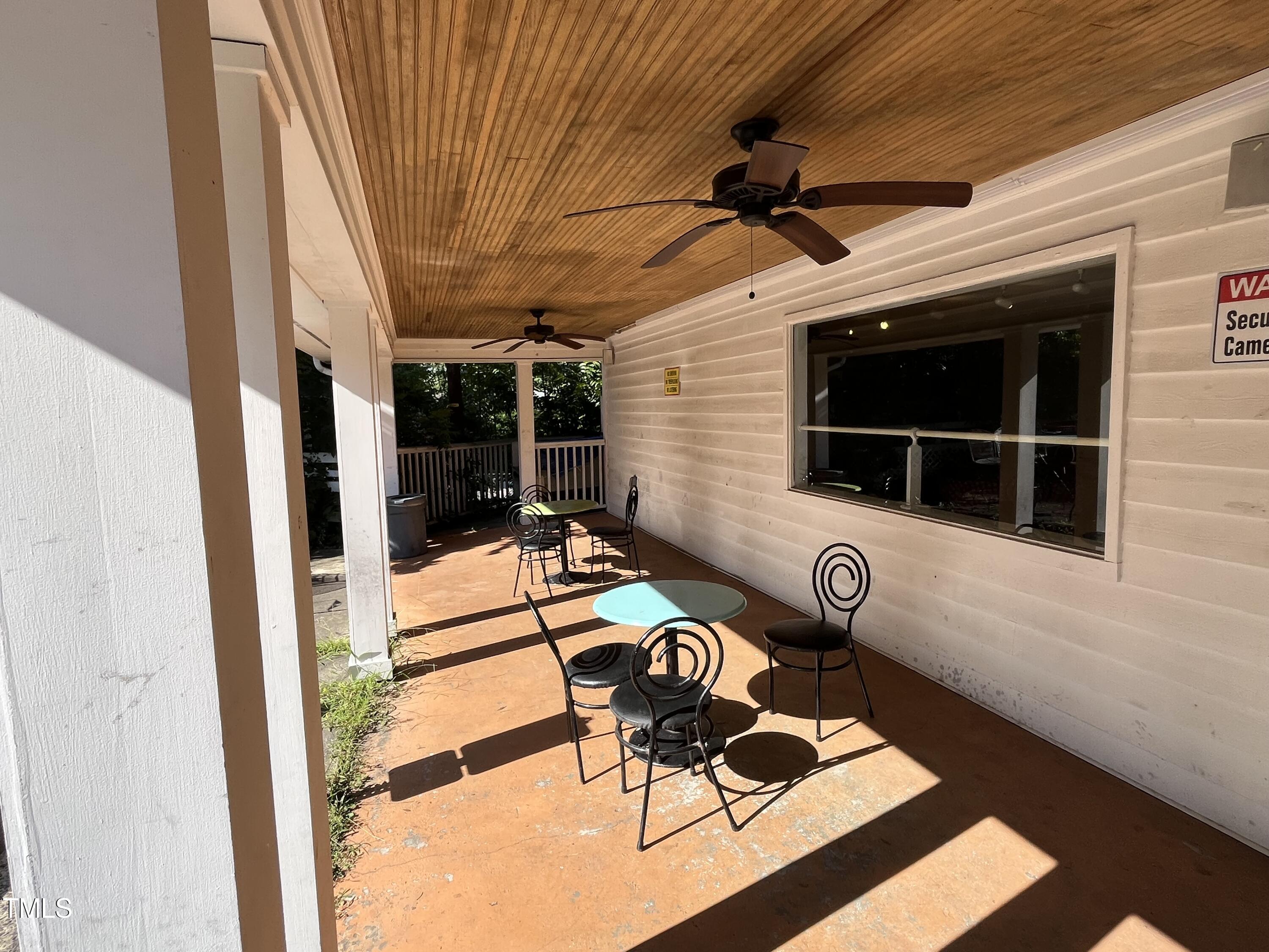2300 Chapel Hill Road Durham, NC 27707 - Photo 3 of 8 a balcony with table and chairs
