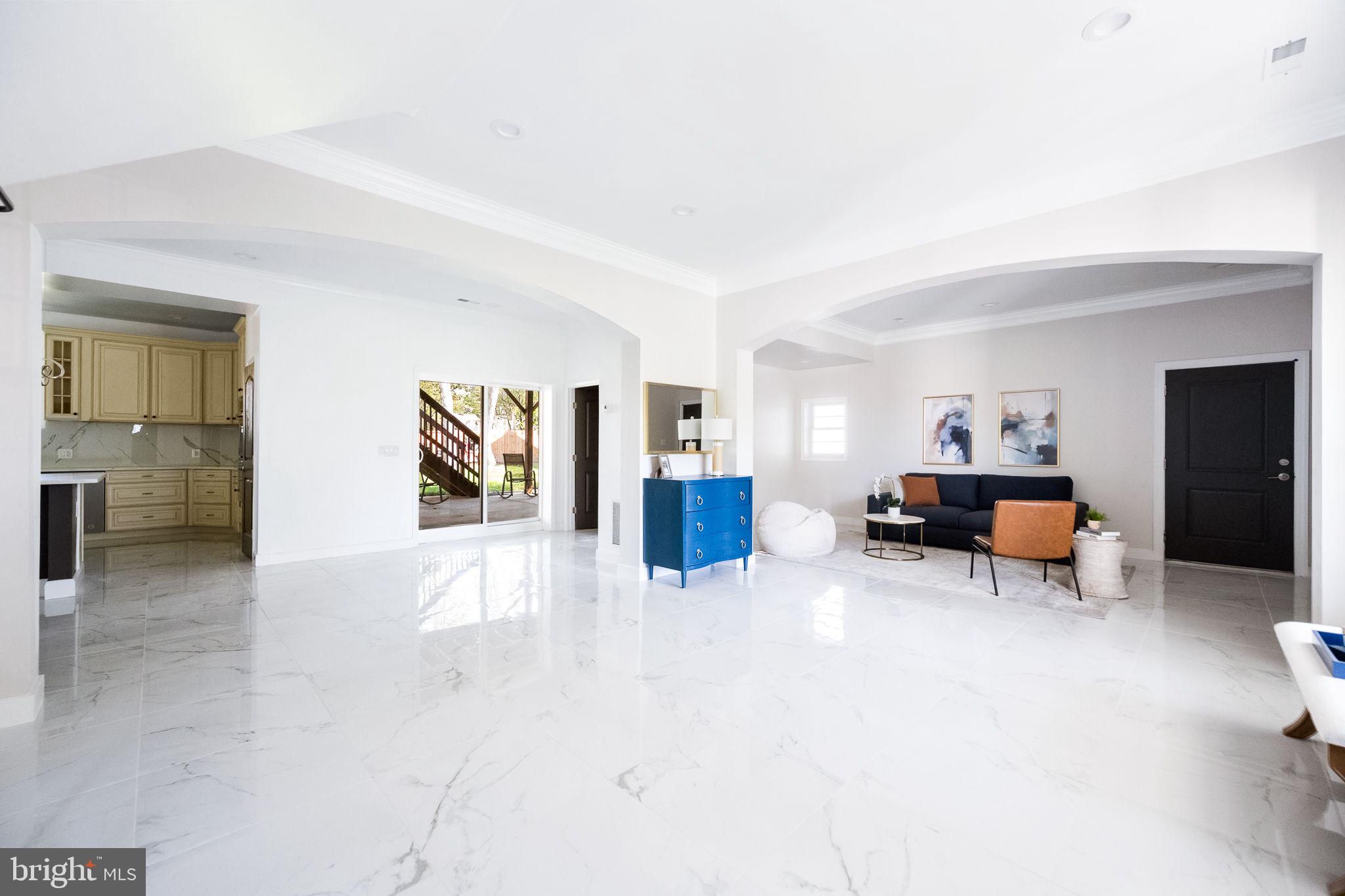 6709 Benson Drive Alexandria, VA 22306 - Photo 16 of 66 a living room with furniture and a couch