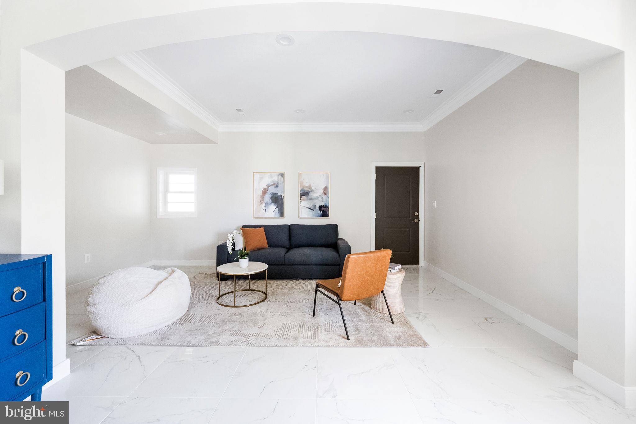 6709 Benson Drive Alexandria, VA 22306 - Photo 18 of 66 a living room with furniture and a table