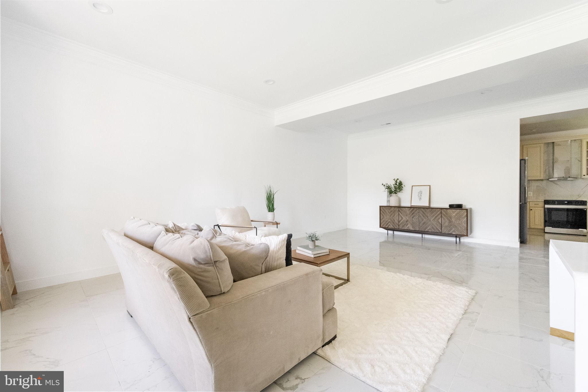 6709 Benson Drive Alexandria, VA 22306 - Photo 20 of 66 a living room with furniture and a couch