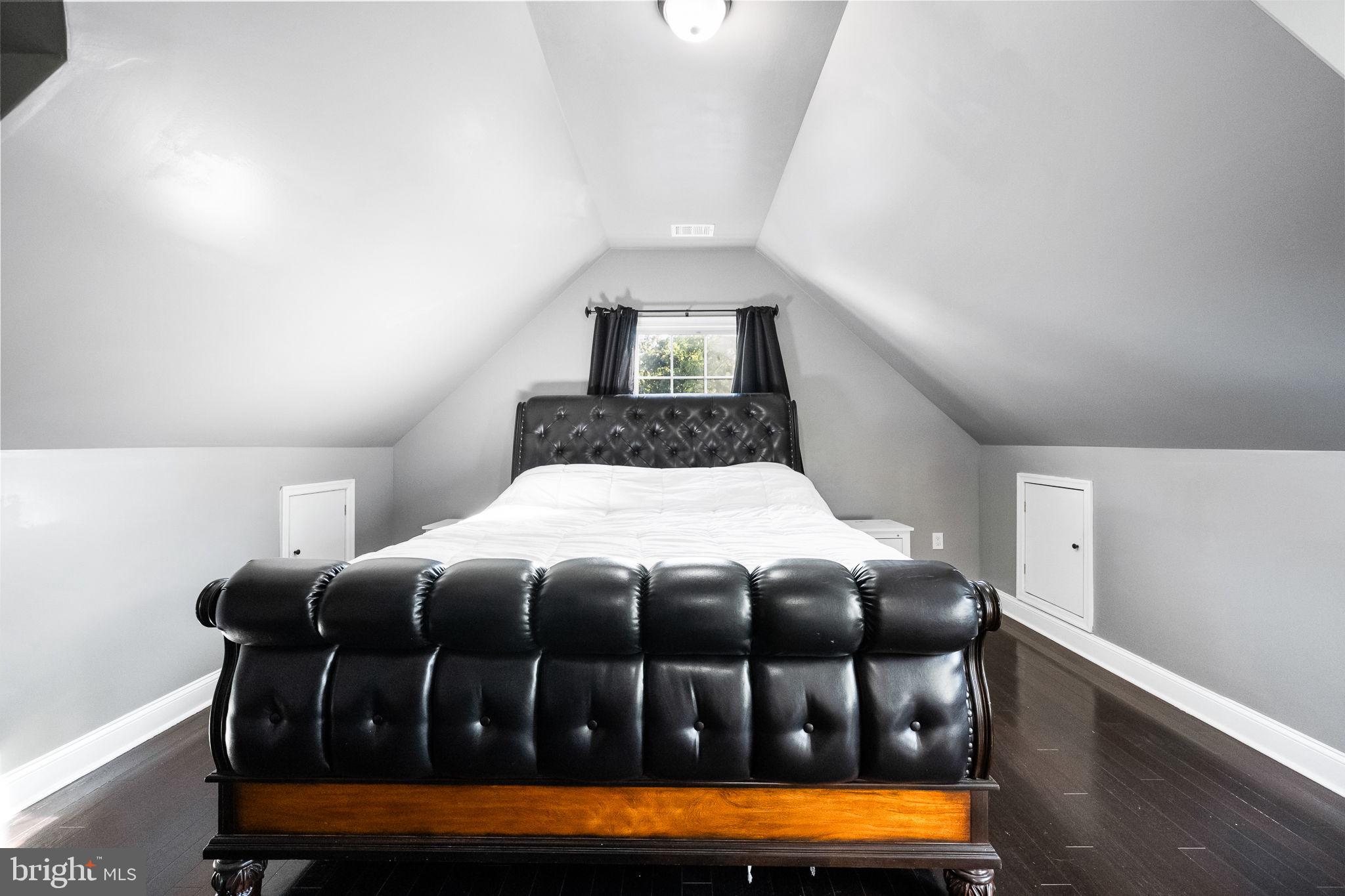 6709 Benson Drive Alexandria, VA 22306 - Photo 45 of 66 a bedroom with a bed window and dresser