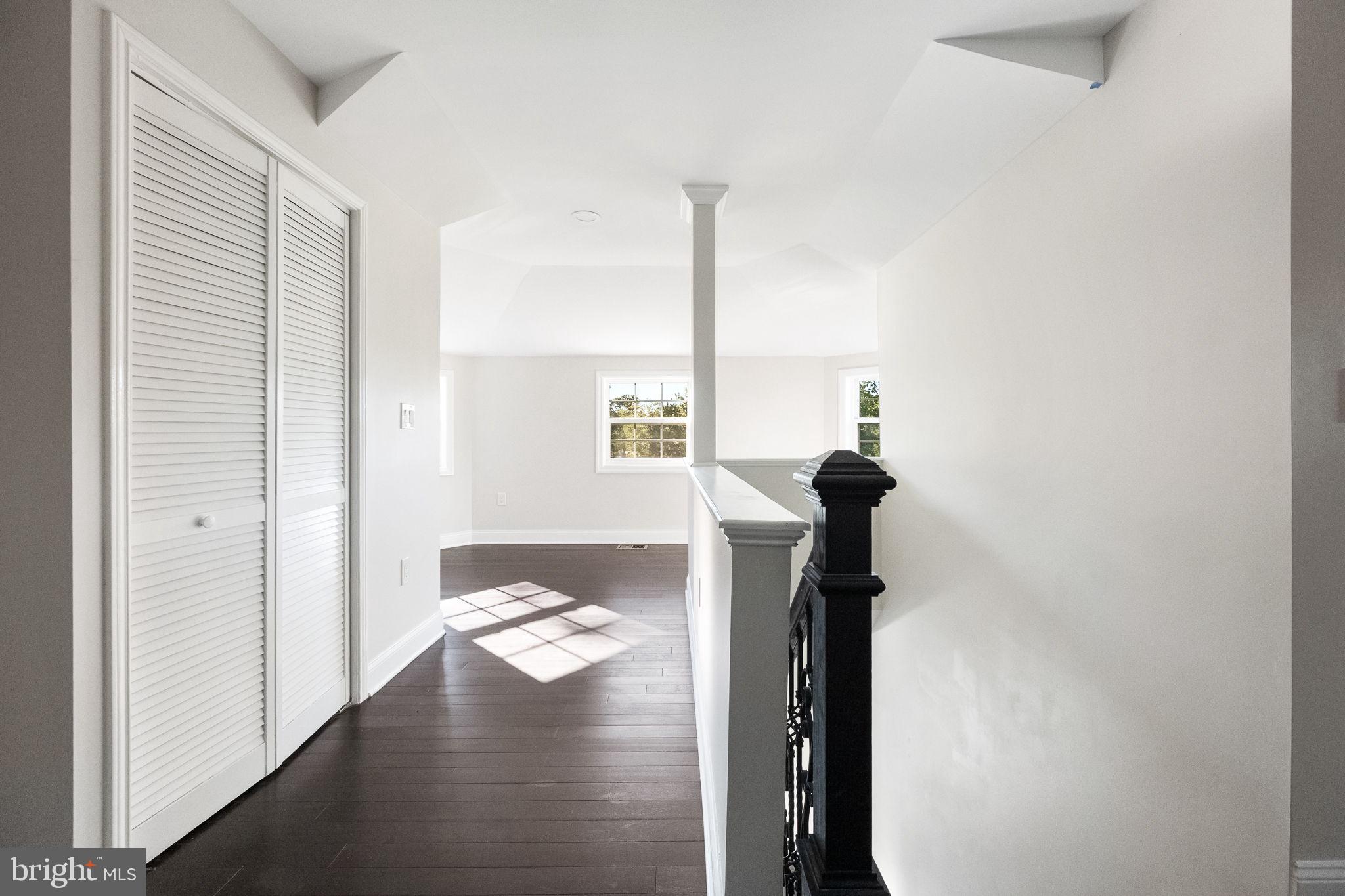 6709 Benson Drive Alexandria, VA 22306 - Photo 49 of 66 a view of a hallway with windows