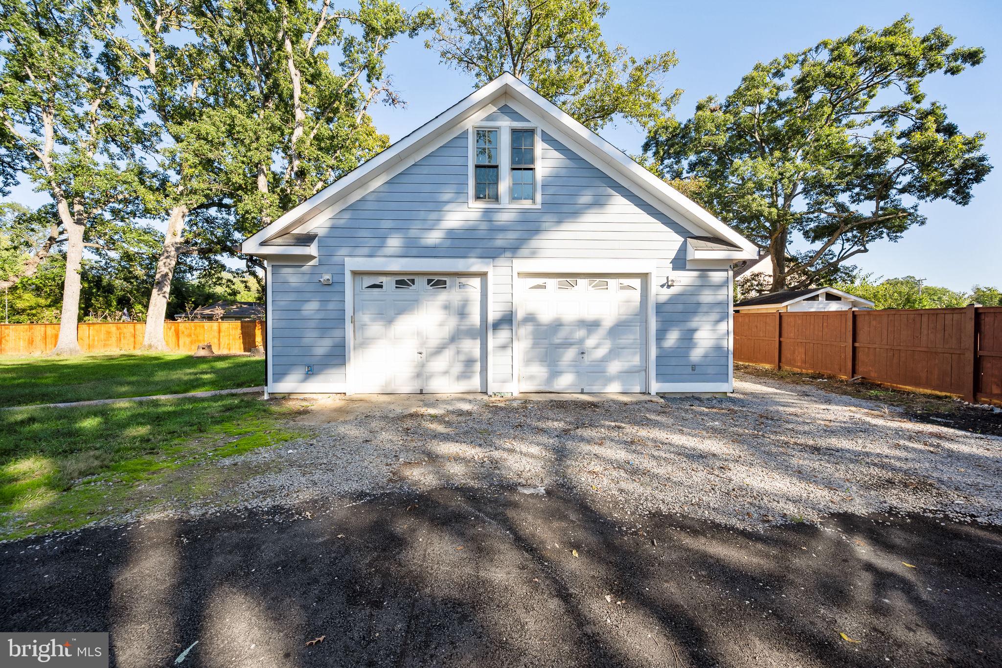 6709 Benson Drive Alexandria, VA 22306 - Photo 6 of 66 a front view of house with yard and green space