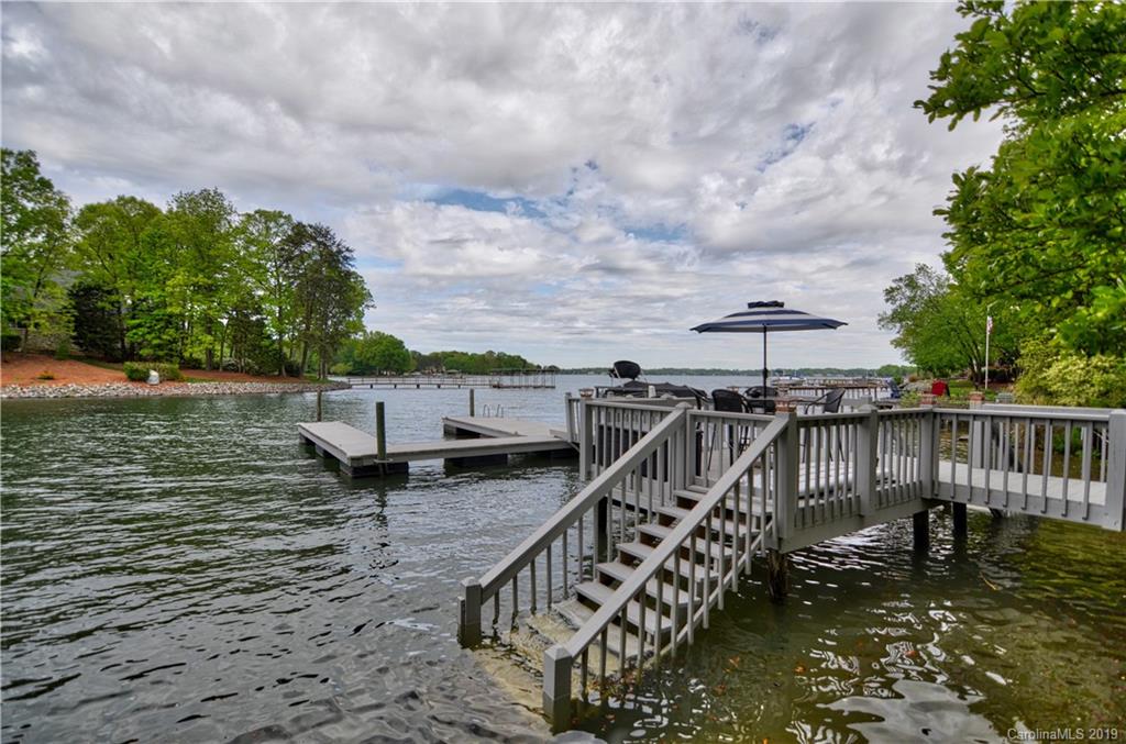 20210 Bascom Ridge Drive Cornelius, NC 28031 - Photo 3 of 35 a view of a lake with boats in roof deck