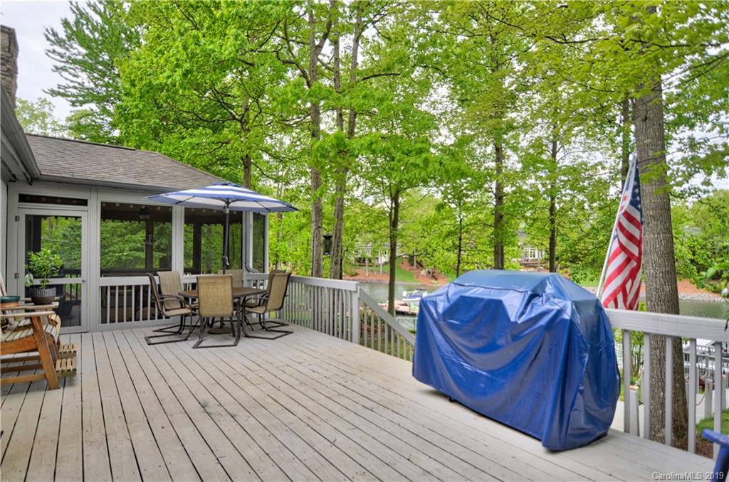 20210 Bascom Ridge Drive Cornelius, NC 28031 - Photo 26 of 35 a view of backyard with outdoor seating and trees