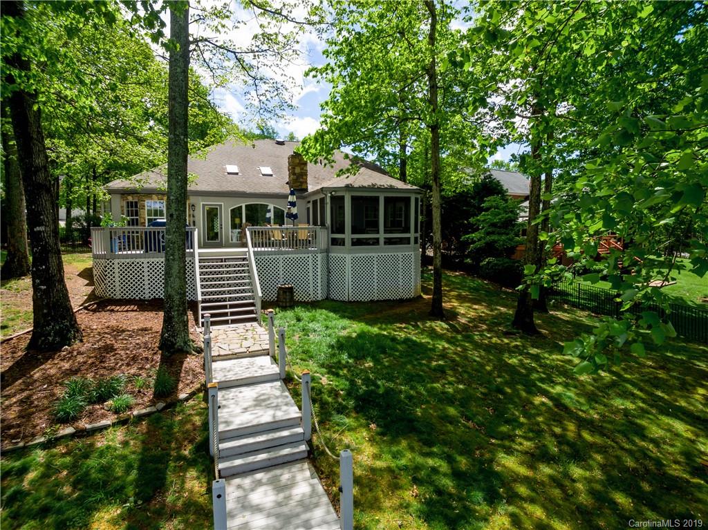 20210 Bascom Ridge Drive Cornelius, NC 28031 - Photo 30 of 35 a front view of a house with a yard