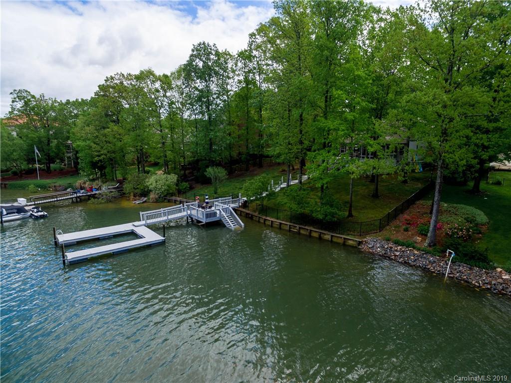 20210 Bascom Ridge Drive Cornelius, NC 28031 - Photo 35 of 35 an aerial view of a house with swimming pool a yard and lake view