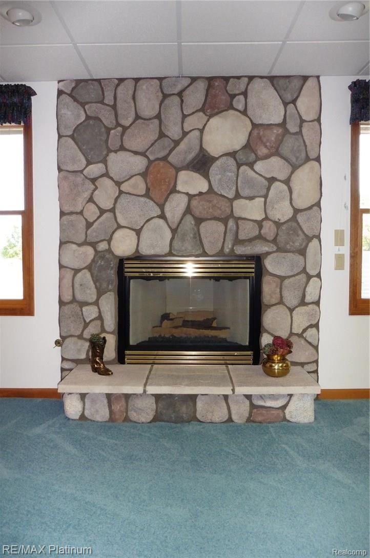 3730 Oak Grove Road Howell, MI 48855 - Photo 29 of 43 BasementFireplace.JPG