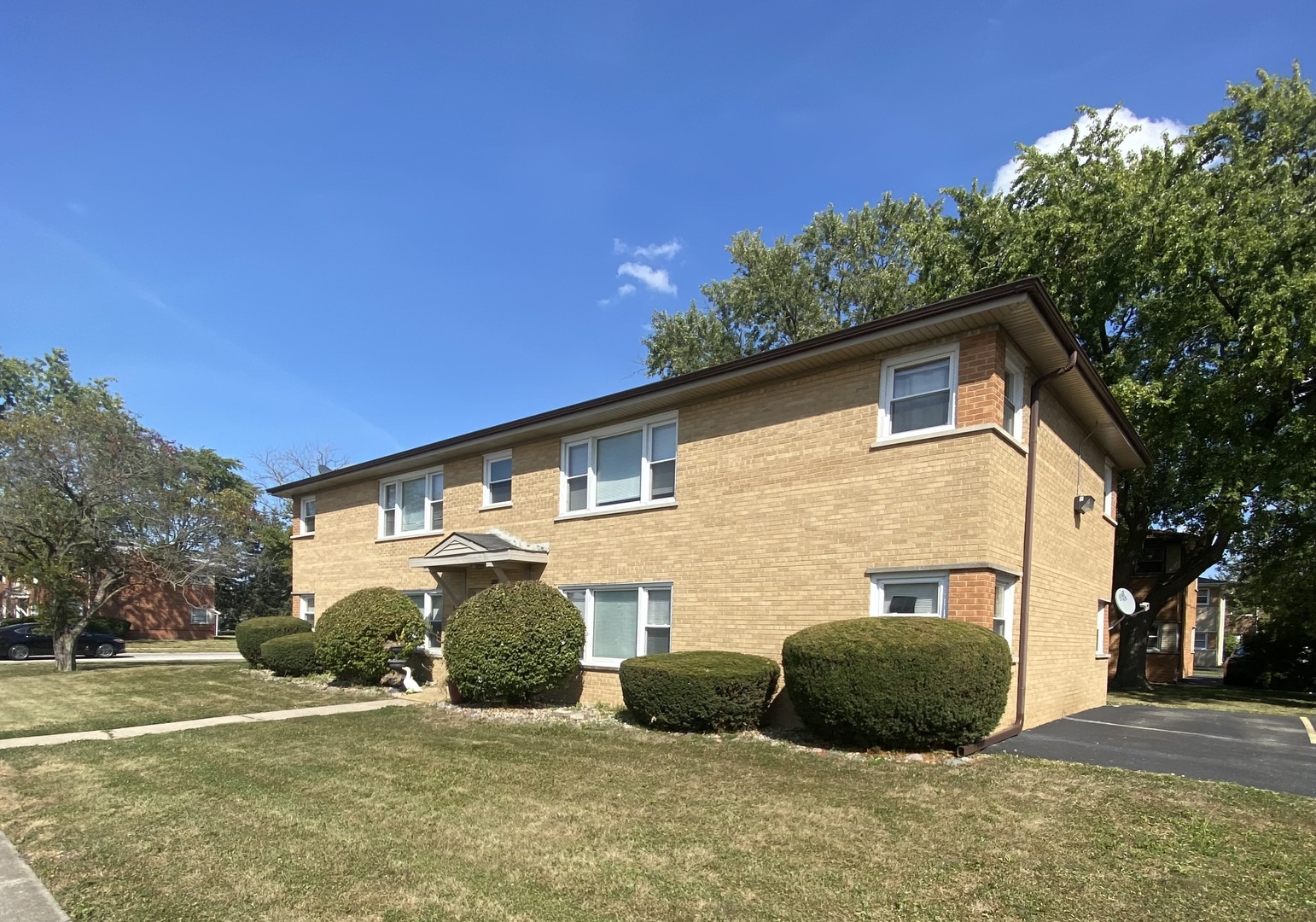 18231 Morgan Avenue, Unit 2N Homewood, IL 60430 - Photo 2 of 28 a view of a house with a yard
