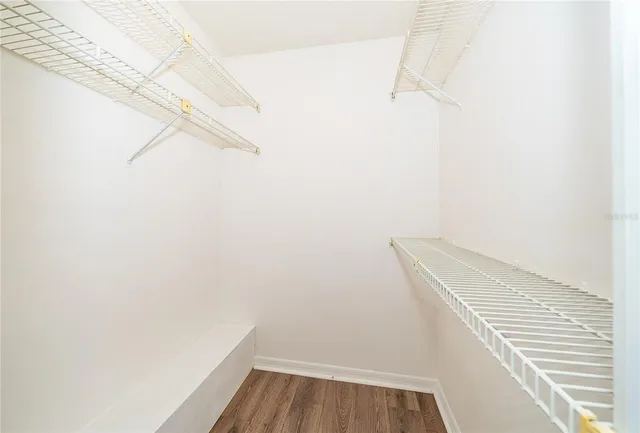 a view of a room with racks on the wall