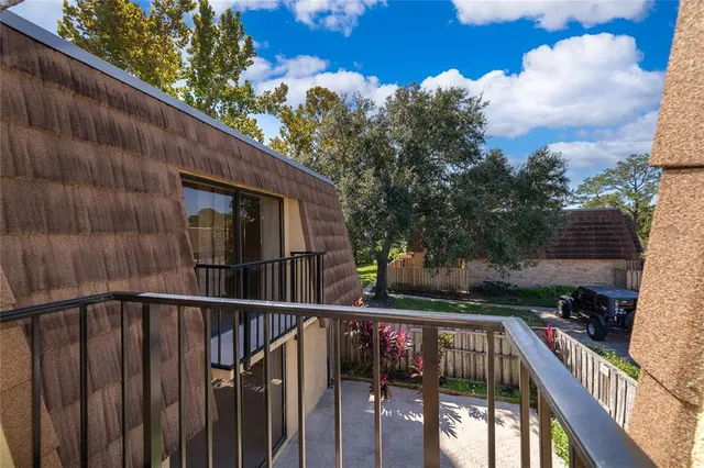 a view of street from balcony