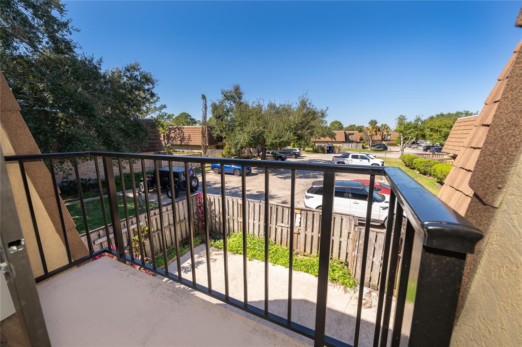 5258 Coral Court, Unit 605 Orlando, FL 32811 - Photo 32 of 41 a view of a balcony with city view