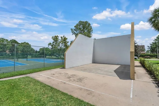 a view of backyard with green space