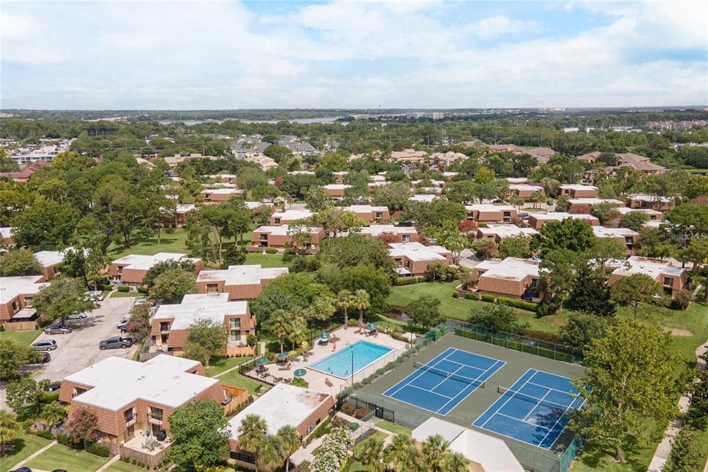 5258 Coral Court, Unit 605 Orlando, FL 32811 - Photo 39 of 41 an aerial view of multiple house