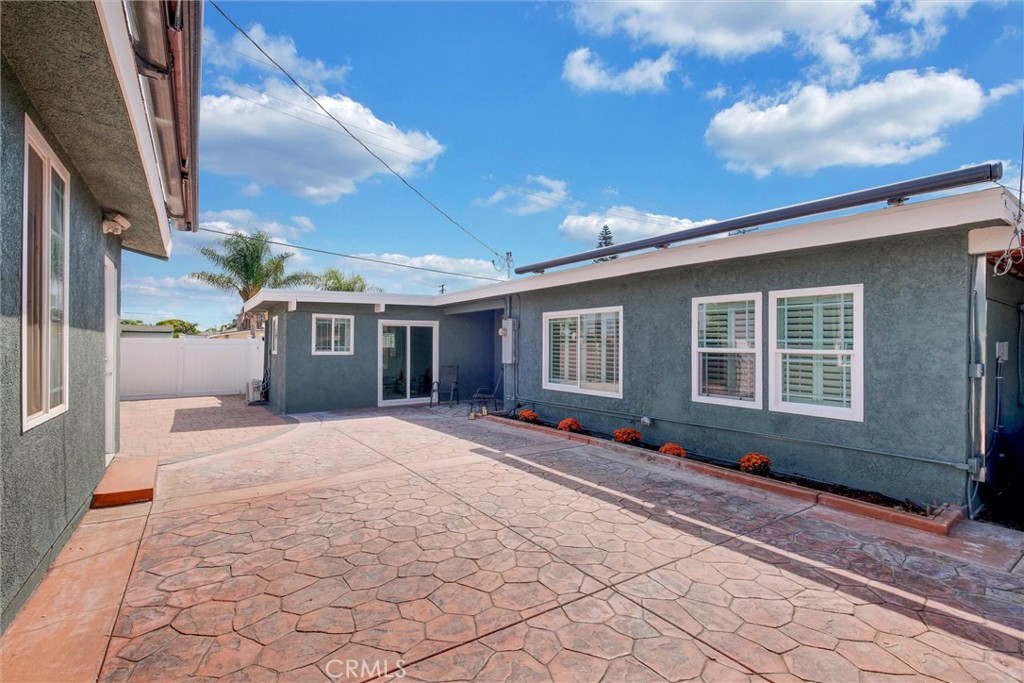 1401 West 165th Street Compton, CA 90220 - Photo 29 of 31 a front view of a house with a yard and seating space