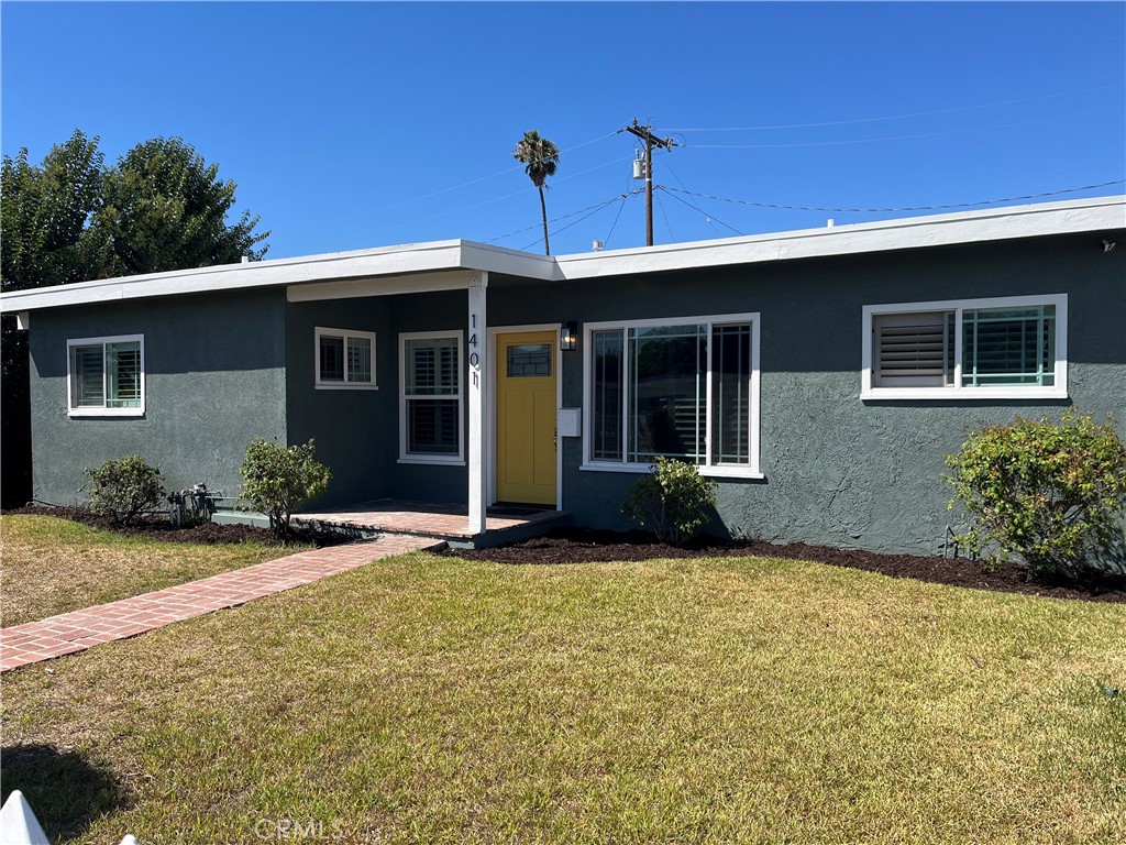 1401 West 165th Street Compton, CA 90220 - Photo 31 of 31 a view of a house with backyard and porch