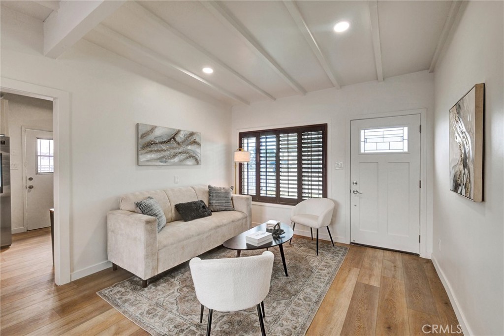1401 West 165th Street Compton, CA 90220 - Photo 5 of 31 a living room with furniture and wooden floor