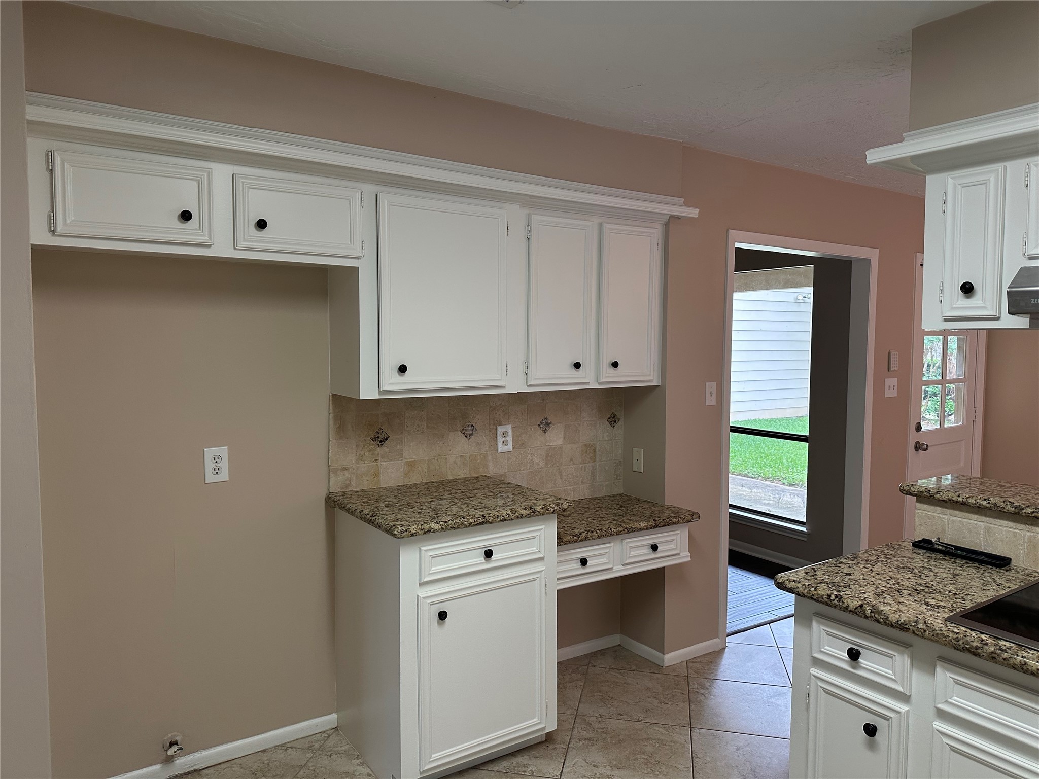 17406 Spicewood Springs Lane Spring, TX 77379 - Photo 13 of 50 a kitchen with a cabinets window and appliances