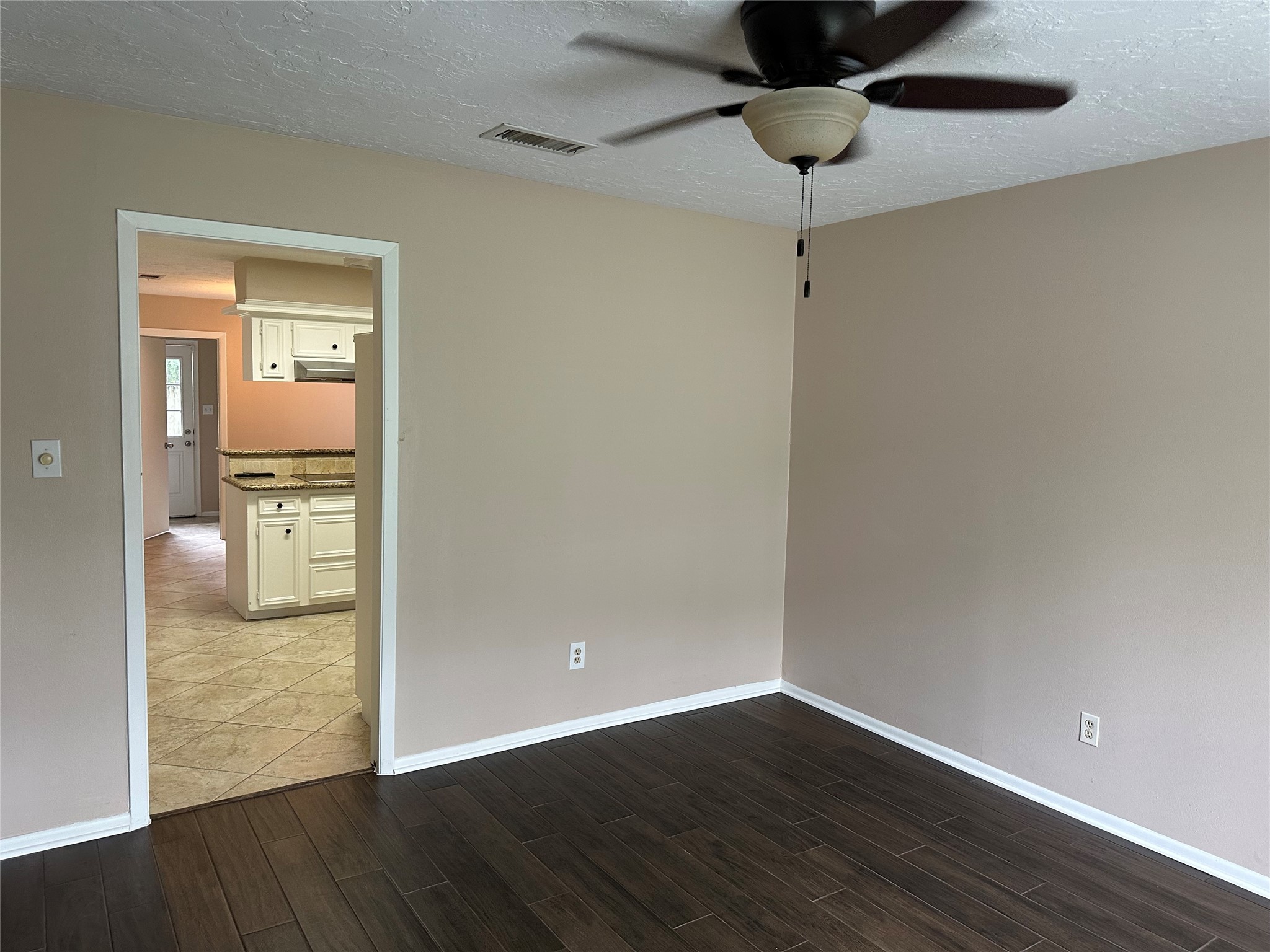 17406 Spicewood Springs Lane Spring, TX 77379 - Photo 16 of 50 a view of an empty room and wooden floor