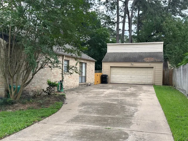 a view of an empty room with windows