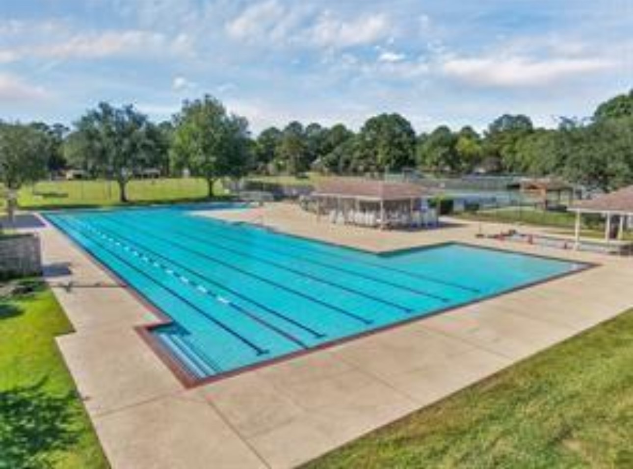 17406 Spicewood Springs Lane Spring, TX 77379 - Photo 42 of 50 a view of a swimming pool with a lake view