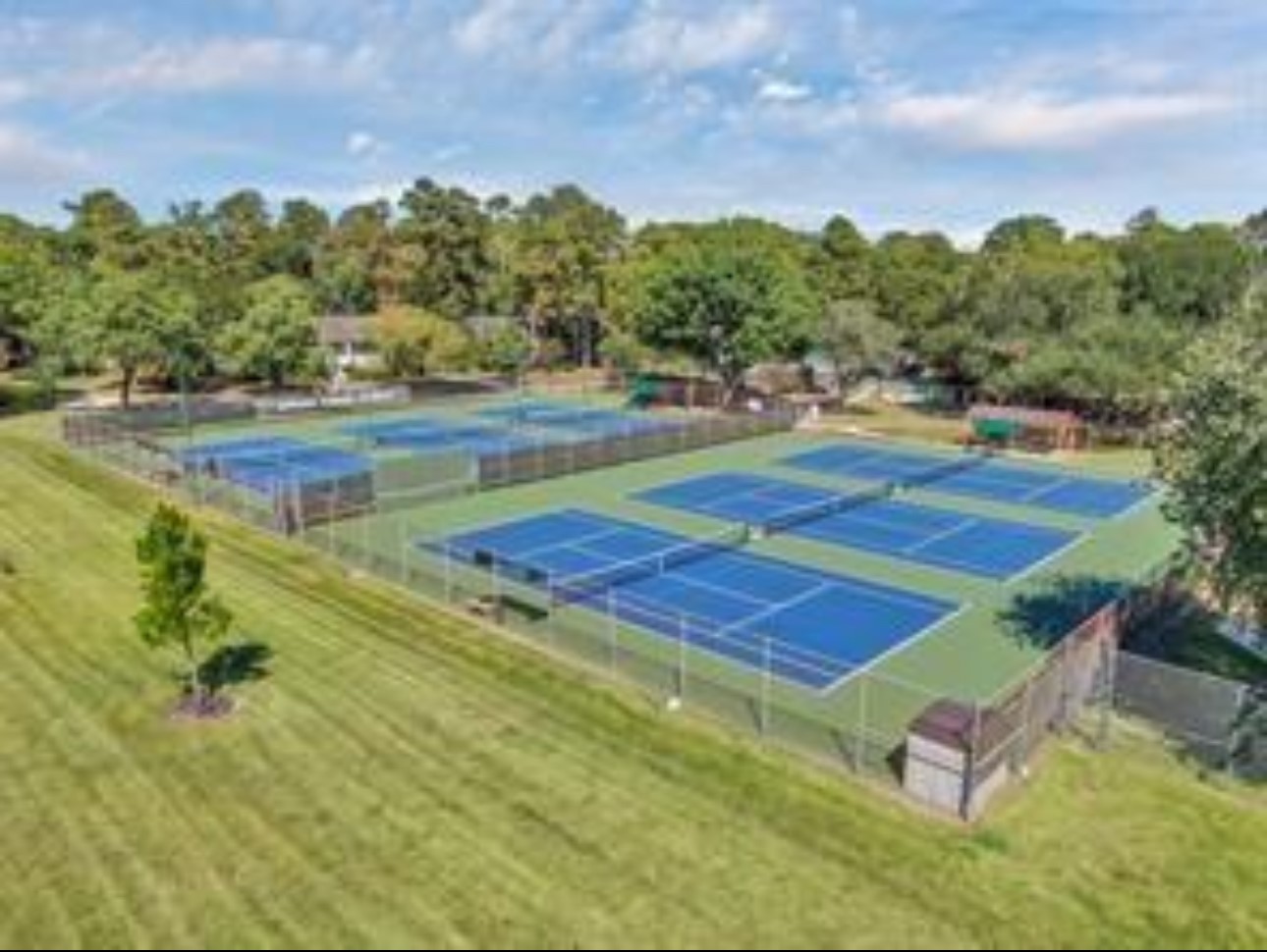 17406 Spicewood Springs Lane Spring, TX 77379 - Photo 43 of 50 a view of a tennis court