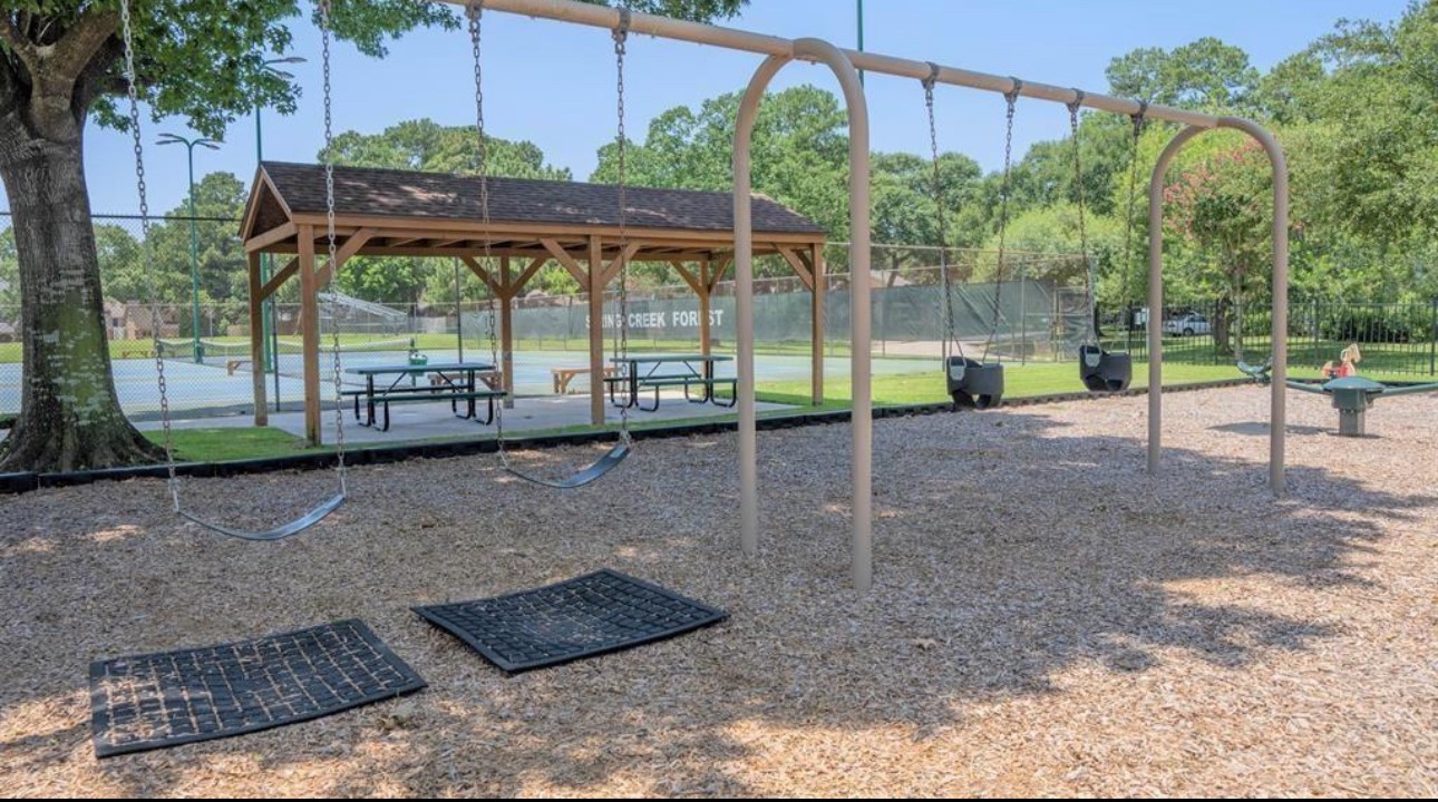 17406 Spicewood Springs Lane Spring, TX 77379 - Photo 46 of 50 a view of a park with iron fence
