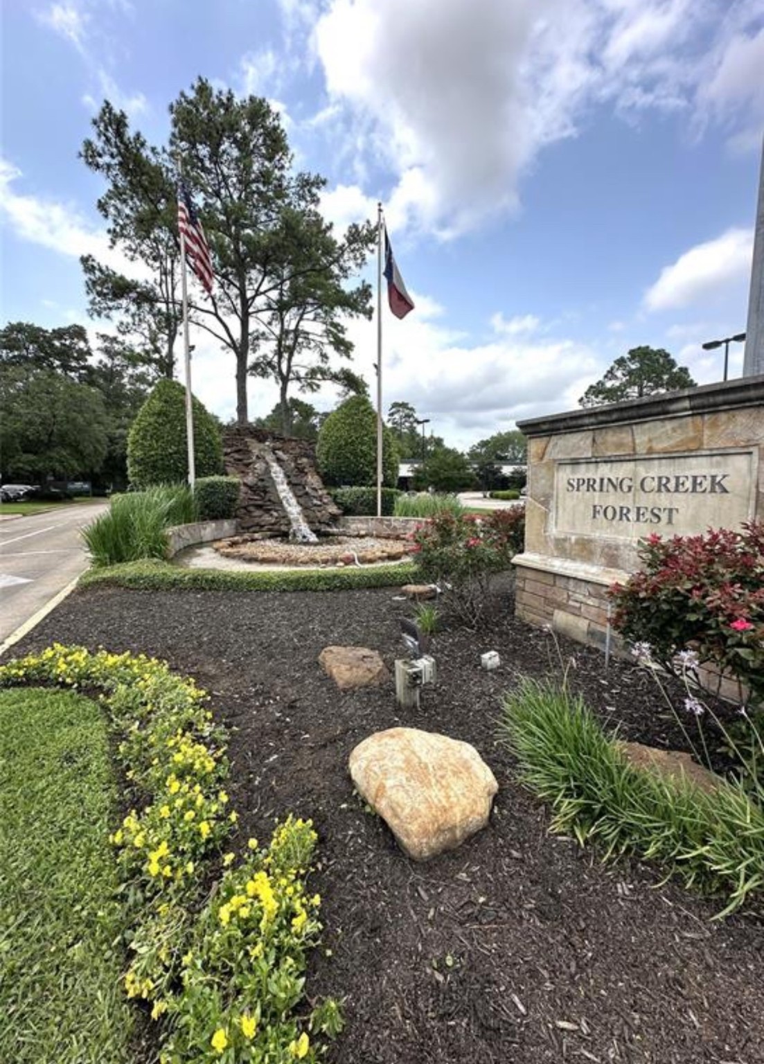 17406 Spicewood Springs Lane Spring, TX 77379 - Photo 48 of 50 a view of a water fountain in front of the house