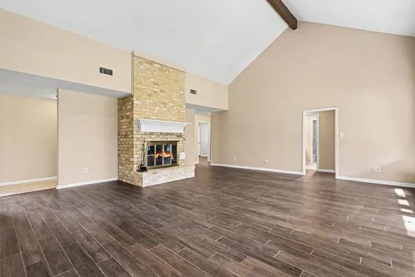 a view of a kitchen with a sink cabinet and a window