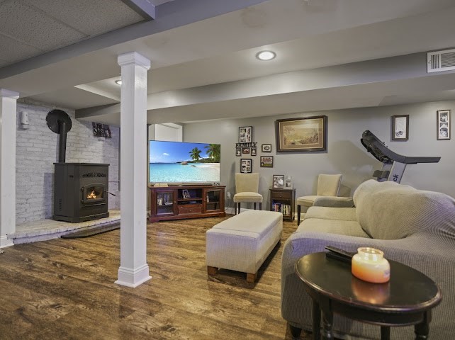 9 Middlefield Place Acushnet, MA 02743 - Photo 13 of 14 a living room with furniture and wooden floor