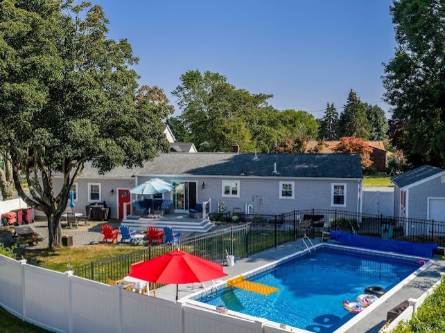 9 Middlefield Place Acushnet, MA 02743 - Photo 2 of 14 an outdoor space with swimming pool and furniture
