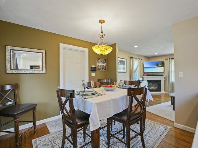 9 Middlefield Place Acushnet, MA 02743 - Photo 8 of 14 a view of a dining room with furniture window and wooden floor