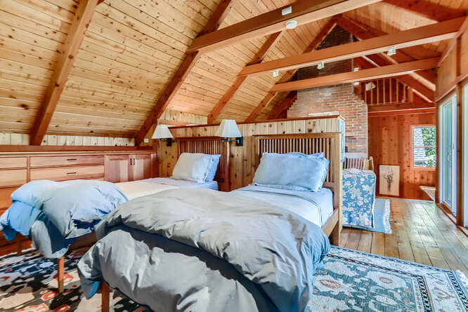 14 Ephriam Allen Road West Tisbury, MA 02568 - Photo 12 of 17 a bed sitting in a bedroom next to a window