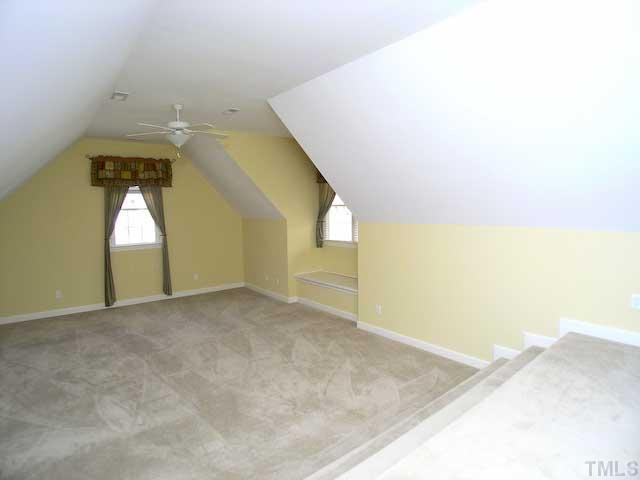 7413 Fontana Ridge Lane Raleigh, NC 27613 - Photo 17 of 25 Guest bedroom is very large and has a huge walk in closet.
