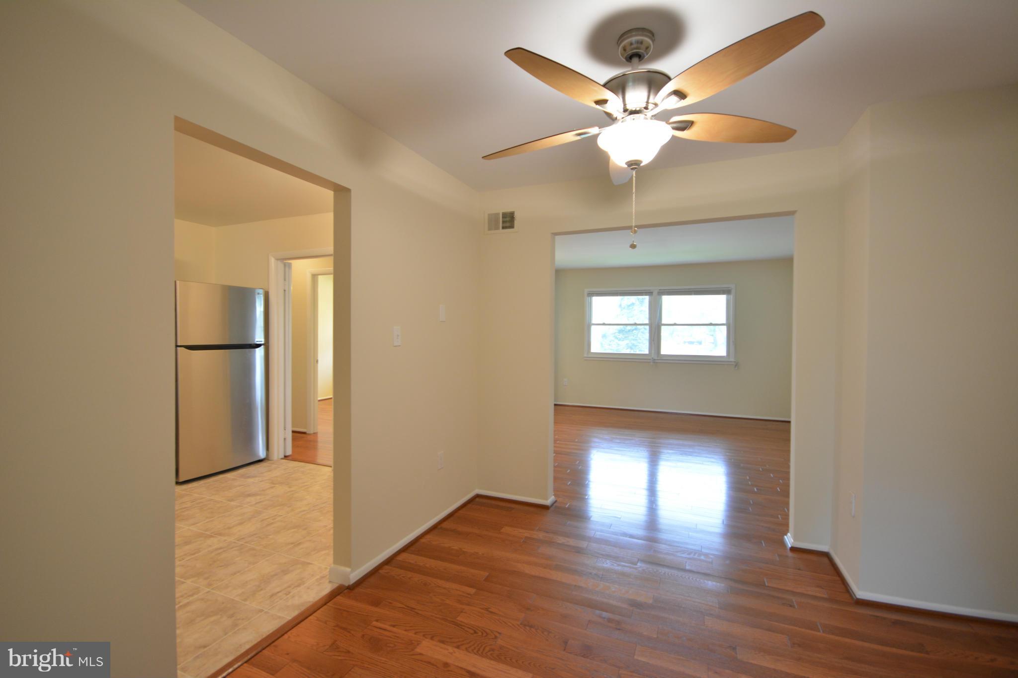 13203 Delaney Road Woodbridge, VA 22193 - Photo 21 of 30 a view of an empty room with a window