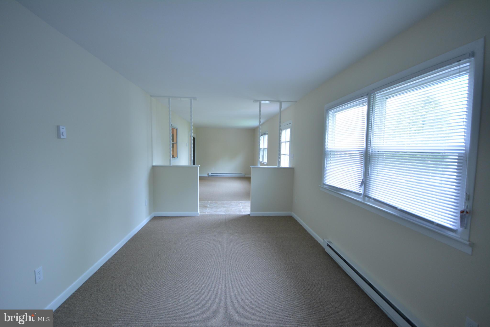 13203 Delaney Road Woodbridge, VA 22193 - Photo 23 of 30 an empty room with windows